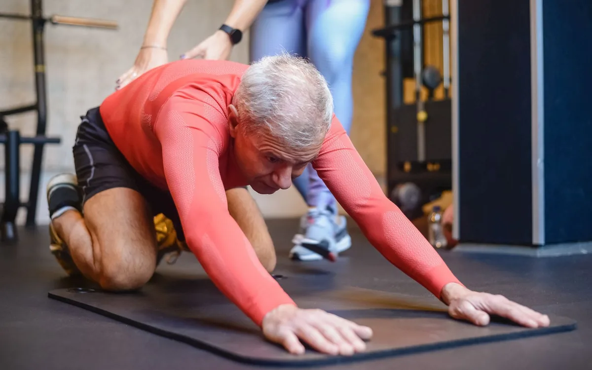 Adult practicing mobility exercises